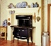 Clean Technology News: The Errigal solid fuel burning cooker incorporates a main oven that has a large capacity. The cooker provides a full width cooking surface. The firebox of the biomass cooker can be loaded in front or on top. The surface of the solid fuel burning cooker can be extended by using the optional side shelves. 
