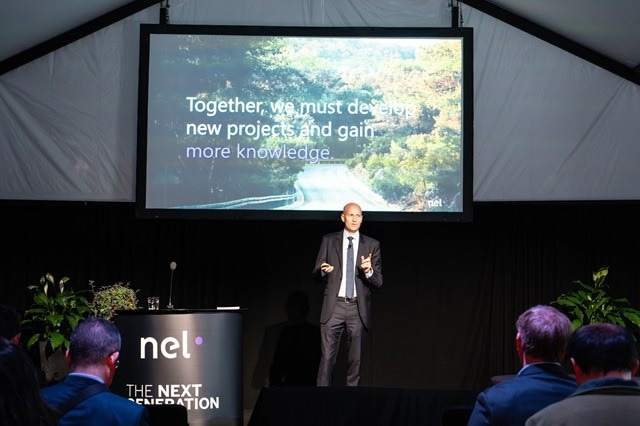 Nel CEO Håkon Volldal speaks on stage at the opening.