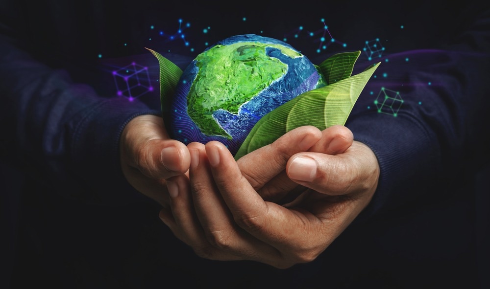 man holding a small earth in hand, sustainability concept