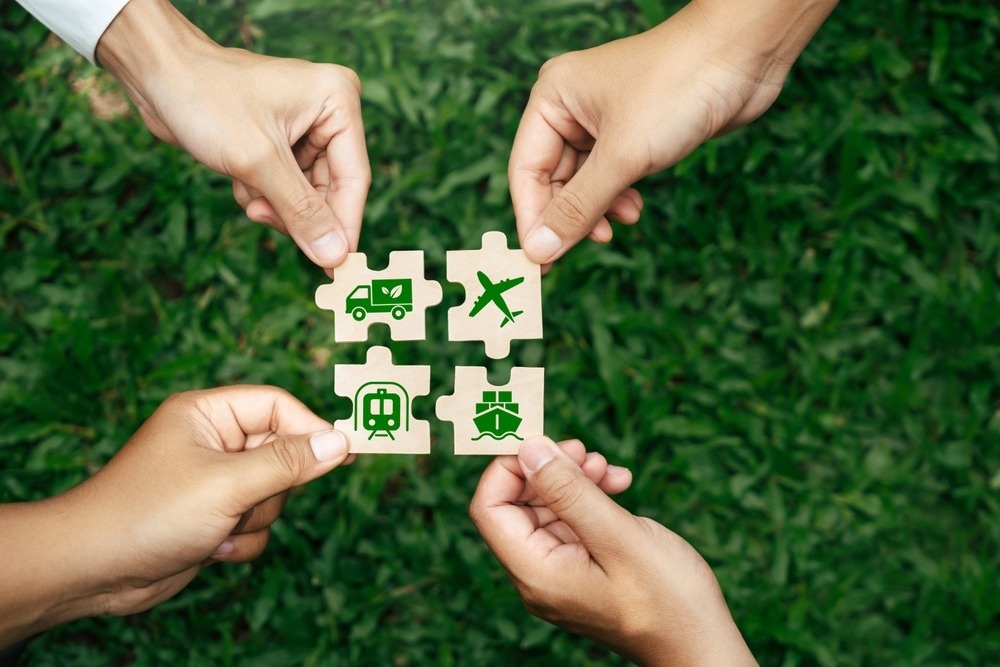 hands holding sustainable transport puzzle