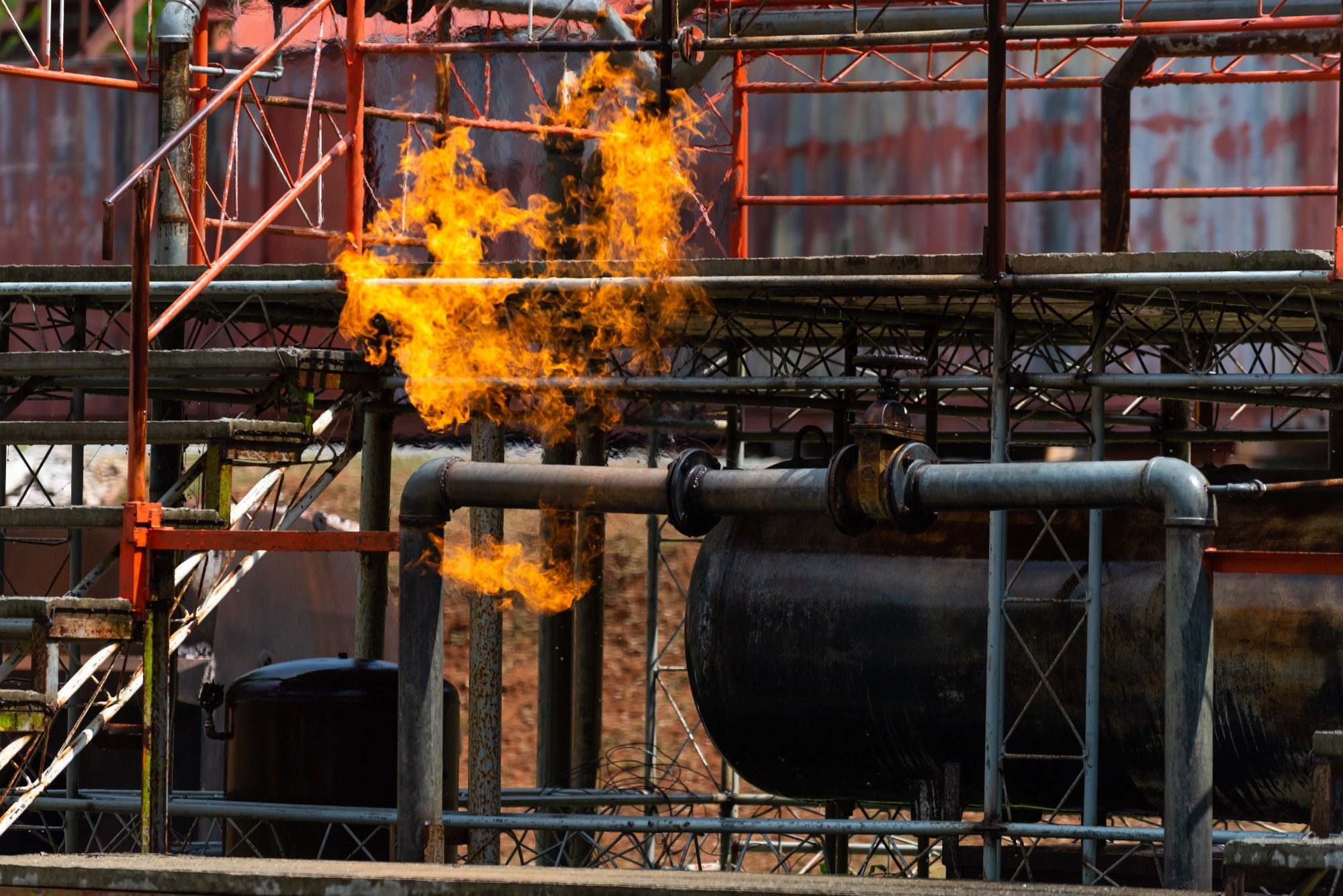 Fire flames engulfing from gas pipeline leaking.
