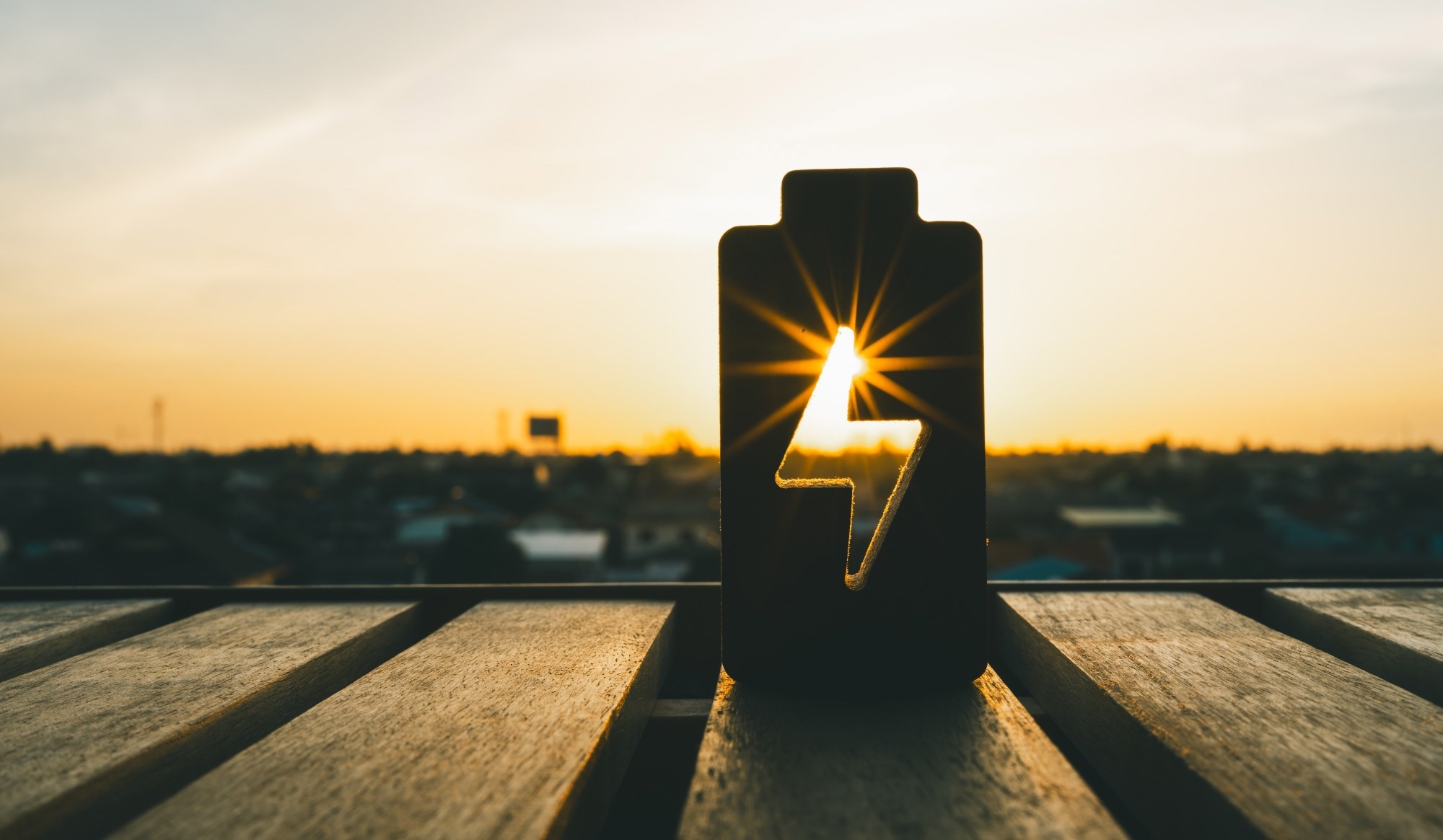 batterie concept with sun in the background