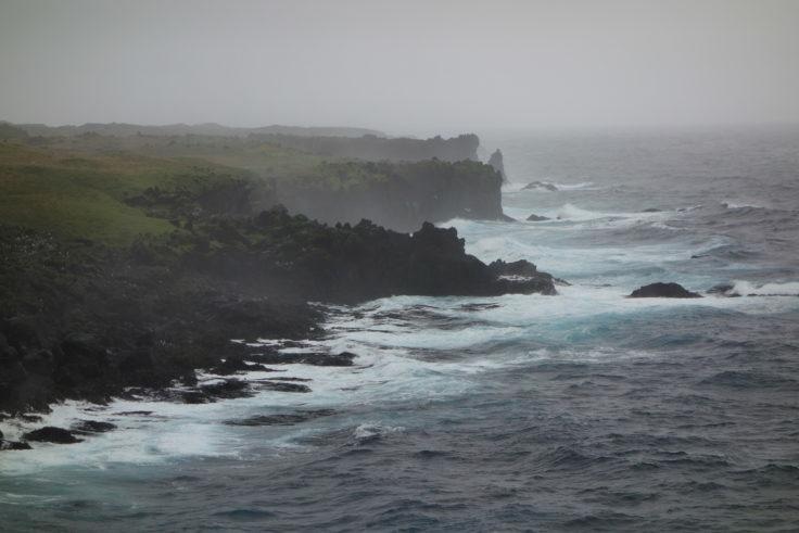 The coast of sub-Antarctic Marion Island. Sea spray is washed over the land and into nearby lakes.
