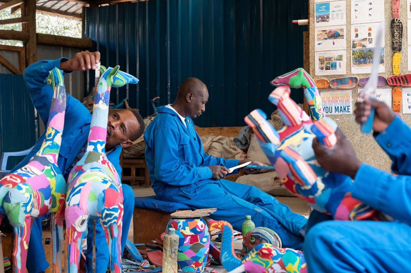 Ocean Sole artists at work.