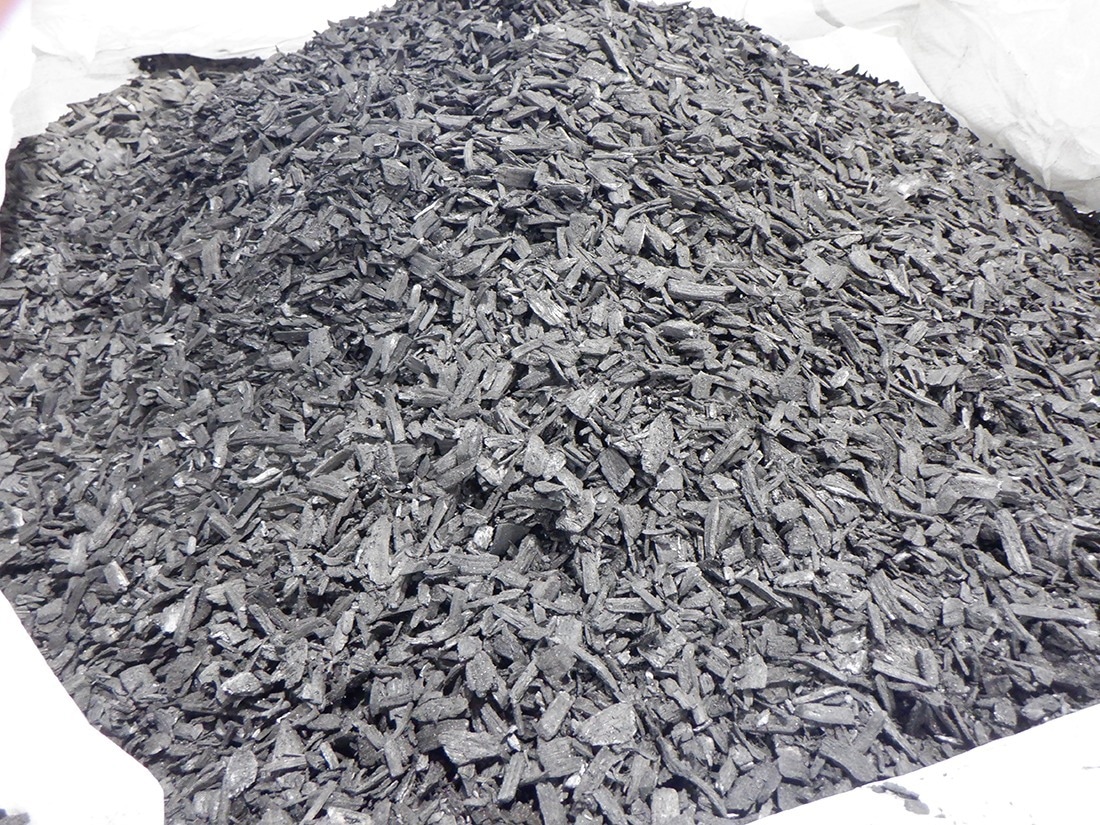 Photograph of Biochar. Biochar comprises organic waste material and is made by pyrolysis, a process that involves heating the organic material in a limited oxygen environment.