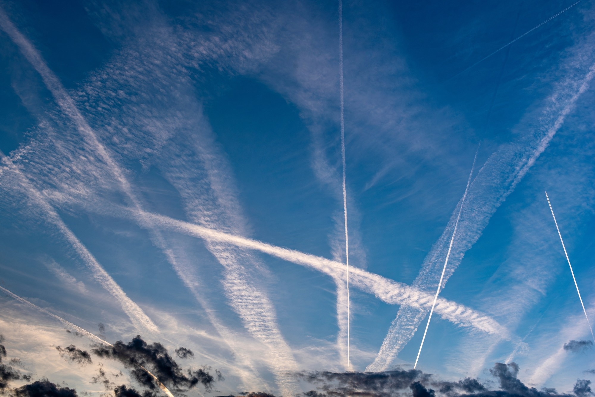 contrails in blue sky
