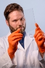 New SolarWindow Process Revolutionizes Transmission of Electricity on Glass