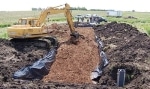 Scientists Find Ways to Reduce Amount of Nitrogen Moving Downstream with Woodchip-Filled Trenches