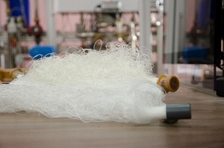 Novel, Efficient Heat Exchange Device with Elements Made of Polymeric Hollow Fibers
