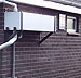 Wall Mounted Rainwater Harvesting System Reduces Flooding and Water Consumption