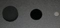 Effectiveness and Efficiency of Solar Energy Conversion Boosted by Dark Material