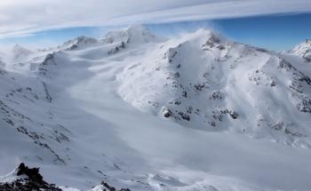 Modelling Snowdrifts on a Glacier