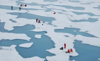 Placing Microspheres on Arctic Sea Ice Increases Global Warming
